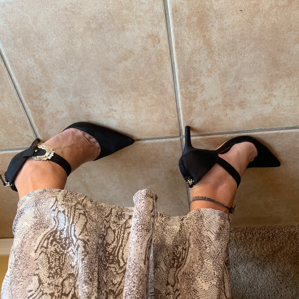 Black heel with gem buckle